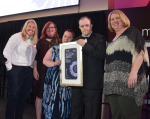 The Ginninderry Team, including Peter and Kathryn, hold their Award